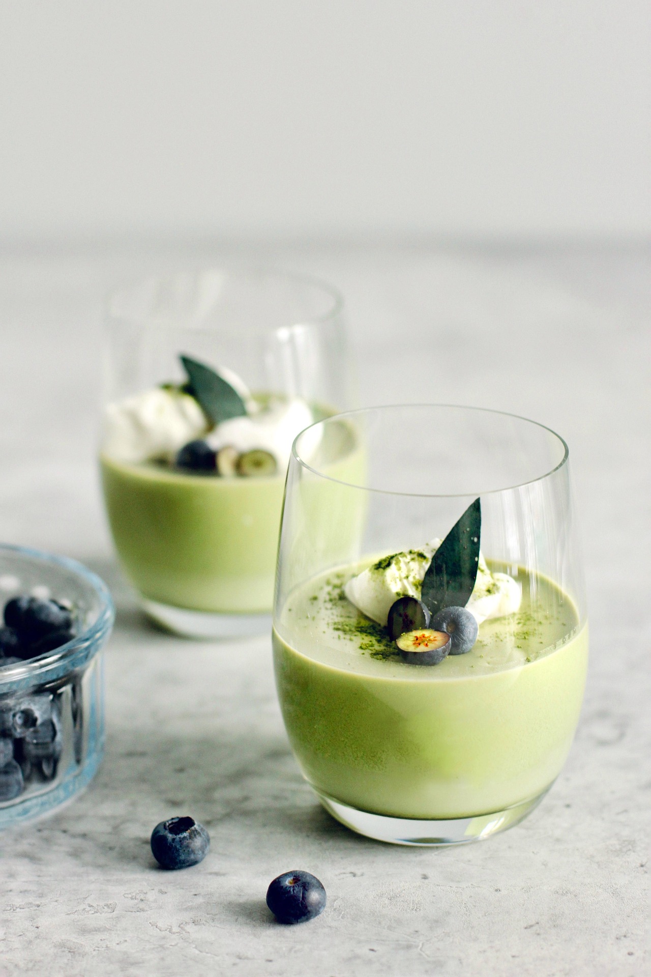 Matcha beverage with fruit garnish